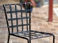 Wrought iron chair, woven