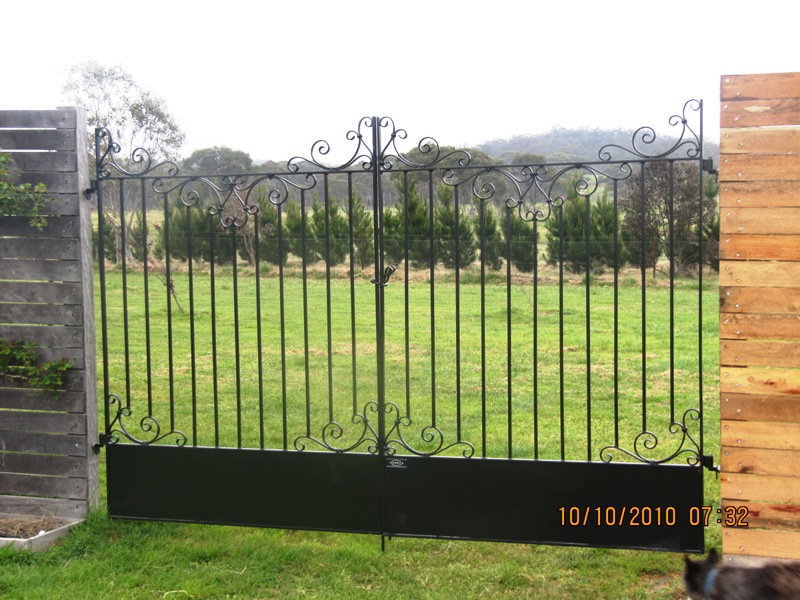 Custom wrought iron gates with leaf barrier, Braidwood NSW
